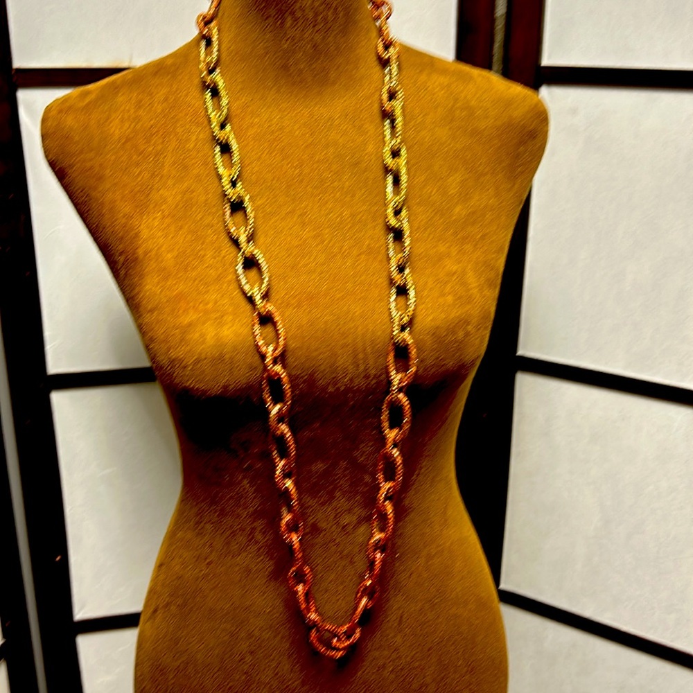 KMO necklace designer rust, and gold bling